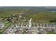 Aerial view of the neighborhood adjacent to a protected natural area at 15403 Wicked Strong St, Sun City Center, FL 33573