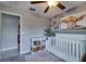 Adorable Bedroom features a cozy crib, ample storage, and themed artwork, perfect for a new arrival at 15403 Wicked Strong St, Sun City Center, FL 33573