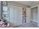 This bedroom has a closet, decorated wall and a window with natural light at 15403 Wicked Strong St, Sun City Center, FL 33573