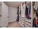 Custom closet provides exceptional storage and organization in this luxury home at 15403 Wicked Strong St, Sun City Center, FL 33573