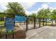Community dog park with separate areas for small and large dogs at 15403 Wicked Strong St, Sun City Center, FL 33573