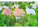 This home includes a refreshing backyard pool, screened-in patio, and mature landscaping at 1610 Stetson Dr, Wesley Chapel, FL 33543