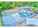 Community pool, basketball court, and slide ensures activities and amenities for everyone at 1610 Stetson Dr, Wesley Chapel, FL 33543