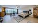 The bedroom includes large windows and an office space at 1710 Lago Vista Blvd, Palm Harbor, FL 34685