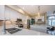 Gourmet kitchen with white cabinets, stainless steel appliances, and tile backsplash at 1710 Lago Vista Blvd, Palm Harbor, FL 34685
