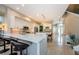 Bright kitchen boasts a large island, sleek white cabinetry, and stainless steel appliances at 1710 Lago Vista Blvd, Palm Harbor, FL 34685