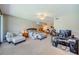 Spacious primary bedroom with sitting area and ample natural light at 1710 Lago Vista Blvd, Palm Harbor, FL 34685