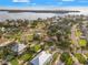 An aerial view captures the property's desirable waterfront location and lush landscaping at 1720 Bayou Grande Ne Blvd, St Petersburg, FL 33703
