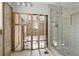 Bathroom with a newly tiled shower, block walls, and open layout at 1720 Bayou Grande Ne Blvd, St Petersburg, FL 33703