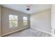 Bright bedroom with carpet and ceiling fan at 17714 Everlong Dr, Land O Lakes, FL 34638