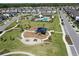 Community park featuring a playground, picnic tables, and lush green spaces for residents to enjoy at 17714 Everlong Dr, Land O Lakes, FL 34638