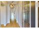 Entryway with decorative lights and wood flooring at 17714 Everlong Dr, Land O Lakes, FL 34638