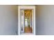 Entryway with decorative lights and wood flooring at 17714 Everlong Dr, Land O Lakes, FL 34638