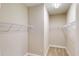 Walk-in closet with wire shelving for organization and storage at 17714 Everlong Dr, Land O Lakes, FL 34638