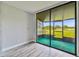 This screened porch offers beautiful golf course views and lets in natural light at 1967 Cormorant Ct # 515, Clearwater, FL 33762
