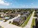 Aerial view of the residences and community, pool and street at 2007 Searay Shore Dr, Clearwater, FL 33763