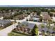 Aerial view showcasing the community amenities like the pool and playground area and the surrounding neighborhood at 2007 Searay Shore Dr, Clearwater, FL 33763