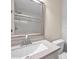 Bathroom sink and vanity with granite countertops and tile flooring at 2007 Searay Shore Dr, Clearwater, FL 33763