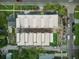 Aerial view of modern townhomes featuring rooftop patios, fresh landscaping, and convenient street access at 2120 4Th S St, St Petersburg, FL 33705