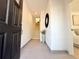 Inviting entryway featuring tiled flooring, a staircase, and a glimpse into an adjacent bedroom at 2120 4Th S St, St Petersburg, FL 33705