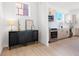 Modern kitchenette with stainless steel appliances and cabinetry complemented by a lovely accent cabinet at 2120 4Th S St, St Petersburg, FL 33705
