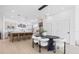Bright, open concept living area with a modern kitchen, dining area, and sleek lighting at 2120 4Th S St, St Petersburg, FL 33705