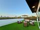 Enjoy breathtaking sunsets on the rooftop deck with comfortable lounge furniture at 2120 4Th S St, St Petersburg, FL 33705