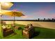 Relax on the rooftop terrace under an umbrella and enjoy the stunning city skyline at dusk at 2120 4Th S St, St Petersburg, FL 33705