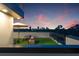 Relaxing rooftop patio offers comfortable seating and picturesque views of the city skyline at sunset at 2120 4Th S St, St Petersburg, FL 33705