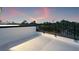 Spacious rooftop terrace with black metal railing featuring ample space for outdoor activities and decor at 2120 4Th S St, St Petersburg, FL 33705