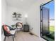 Cozy sitting area with stylish chairs, beverage cooler, decor shelves and access to the roof at 2120 4Th S St, St Petersburg, FL 33705