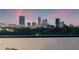 Enjoy stunning city skyline views from this modern rooftop terrace with lush trees below at 2120 4Th S St, St Petersburg, FL 33705