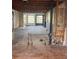 Unfinished interior space with exposed framing, utilities and natural light at 2518 Mabry St, Tampa, FL 33618