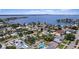 Desirable aerial view of the property with lush landscaping in a tranquil and friendly neighborhood setting at 257 43Rd Ave, St Pete Beach, FL 33706
