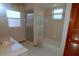 Bathroom featuring a tub, sink with cabinets, and a shower stall at 2784 Alexander Dr, Clearwater, FL 33763