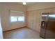 Kitchen with ample cabinetry and modern stainless-steel refrigerator at 2784 Alexander Dr, Clearwater, FL 33763