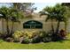 Entrance to Countrygrove East featuring lush landscaping and signage at 2784 Alexander Dr, Clearwater, FL 33763