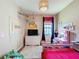 Cozy room featuring fun decor, a ceiling fan, and natural light at 3236 Barbour Trl, Odessa, FL 33556