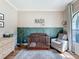 Inviting Bedroom with a neutral color palette, decorative trim, and a cozy reading nook by the window at 3236 Barbour Trl, Odessa, FL 33556