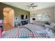 Spacious living area featuring modern furnishings, recessed lighting, and playful decor, ideal for Gathering fun at 3236 Barbour Trl, Odessa, FL 33556
