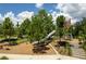 A neighborhood playground featuring a slide, climbing structure, and soft landing area, perfect for recreation at 3236 Barbour Trl, Odessa, FL 33556