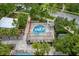 Overhead shot of a colorful community splash pad with various water features, providing a fun and refreshing recreational space at 3236 Barbour Trl, Odessa, FL 33556