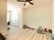 Bonus room features tile flooring and neutral paint at 32977 Kaloko Rd, Wesley Chapel, FL 33543