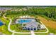 Community clubhouse, pool and basketball court in an aerial view at 32977 Kaloko Rd, Wesley Chapel, FL 33543