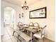 Dining room featuring a chandelier, neutral walls, and dining table at 32977 Kaloko Rd, Wesley Chapel, FL 33543