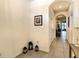 Hallway featuring neutral walls, decorative tiling, and recessed lighting at 32977 Kaloko Rd, Wesley Chapel, FL 33543