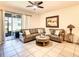 Cozy living room featuring a comfortable sofa and neutral walls at 32977 Kaloko Rd, Wesley Chapel, FL 33543