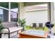 Covered patio with a grill, outdoor seating, plants and a table for enjoying relaxing outdoor meals at 33668 Elm Hill Branch, Wesley Chapel, FL 33545
