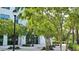 Apartment exterior features sidewalk landscaping, lighting, and manicured plants at 33668 Elm Hill Branch, Wesley Chapel, FL 33545