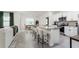 Bright, open kitchen featuring a spacious island, modern appliances, and ample counter space at 33668 Elm Hill Branch, Wesley Chapel, FL 33545